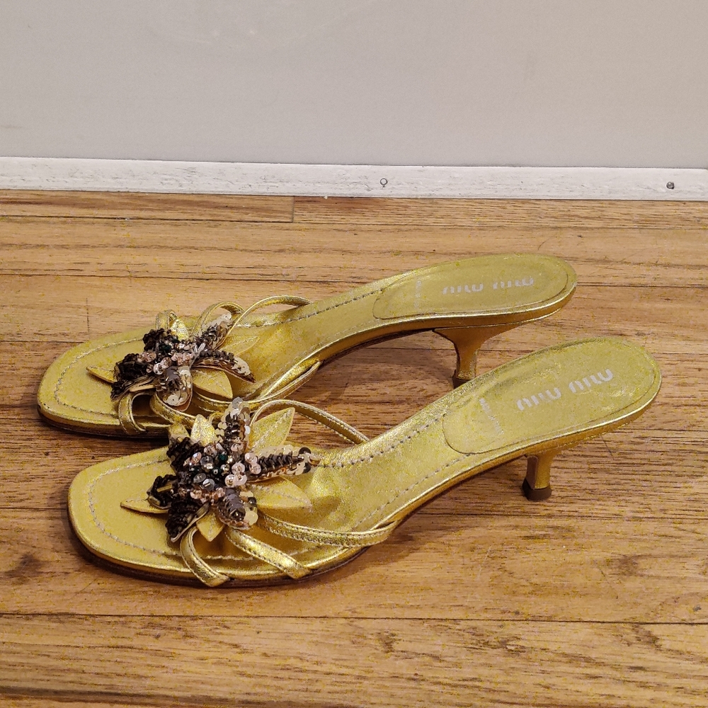 Miu Miu gold kitten heel slides